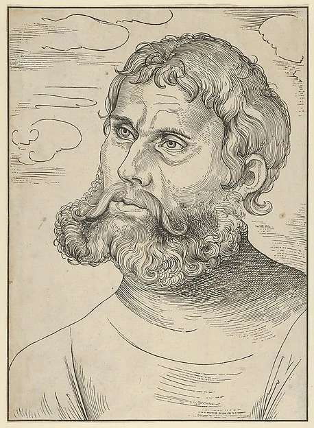 Lucas Cranach the Elder's 1522 woodcut portrait of Martin Luther bearded as Junker Jorg, looking left.
